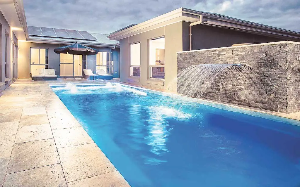 Leisure-Pools-Reflection-including-Splash-Deck-fiberglass-pool-design-shape-range The Reflection including Splash Deck is one of many fiberglass pool designs manufactured by Leisure Pools.
